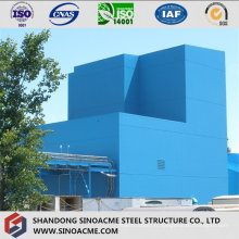 Bâtiment industriel à structure lourde en acier avec galerie